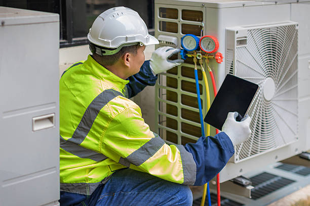 Professional Hvac Maintenance technician working in Lowell, FL
